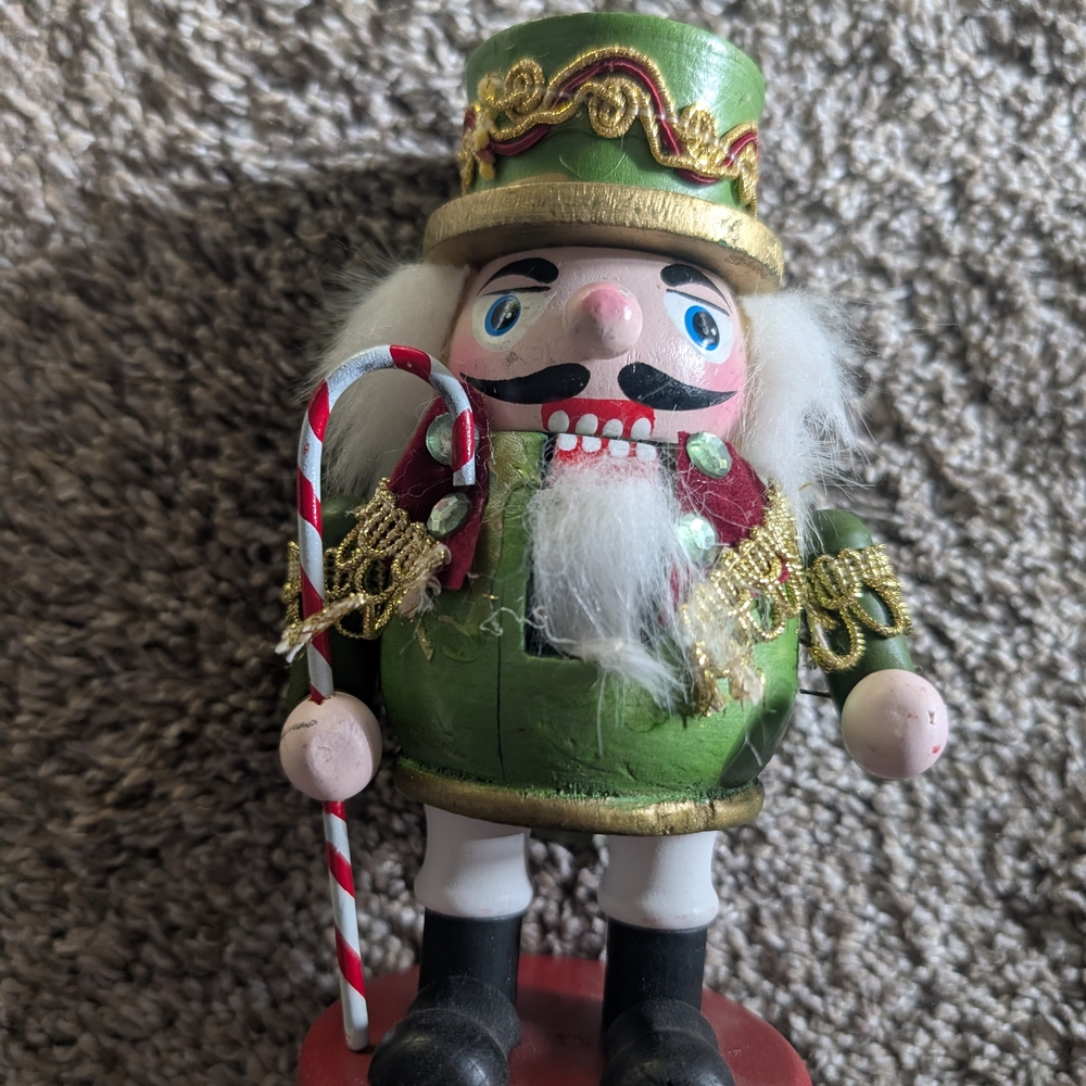 Festive Green Nutcracker with Candy Cane